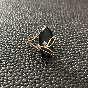 Vintage 10k yellow gold onyx & diamond accent navette ring, excellent pre-owned.